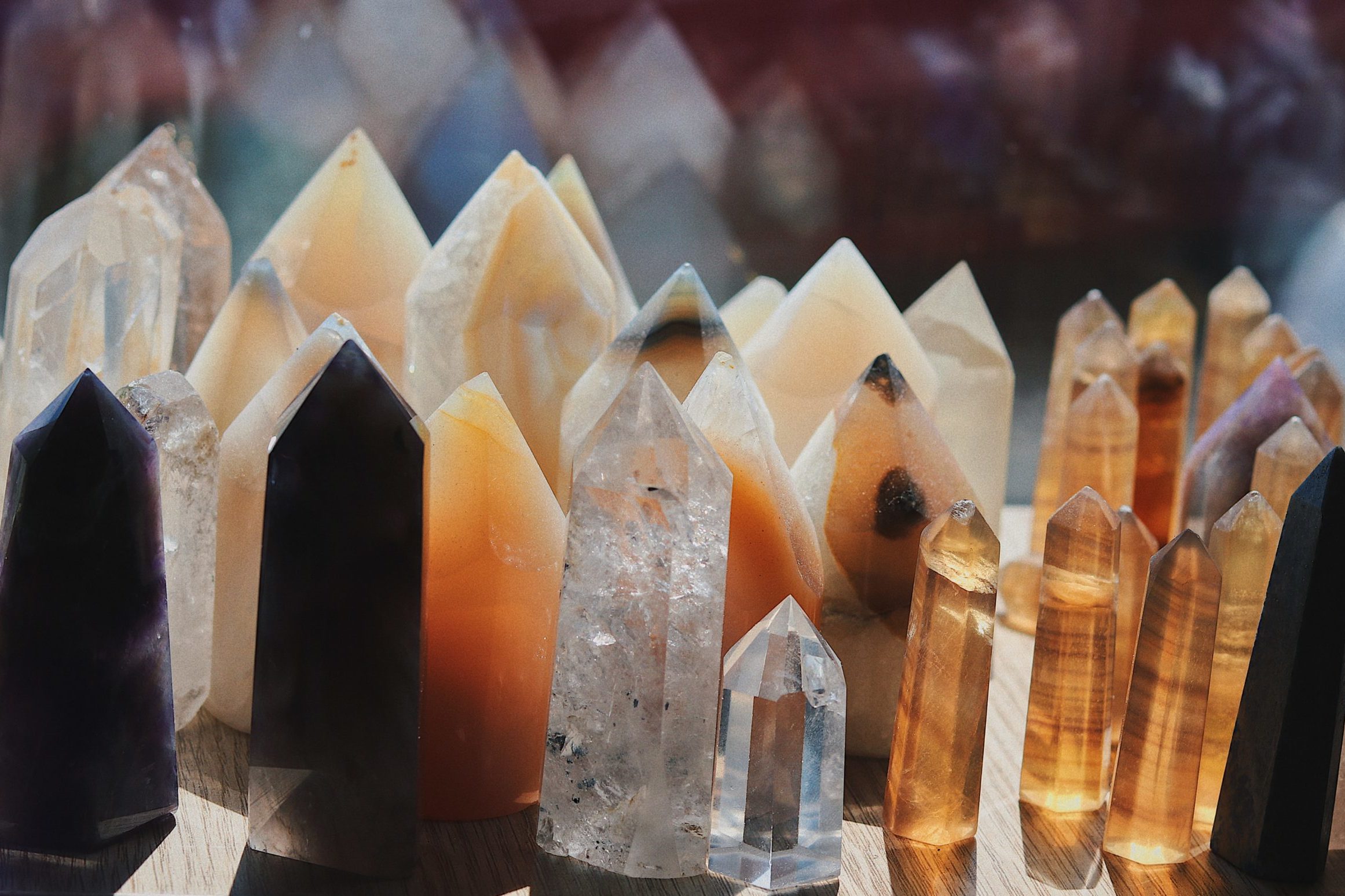 Crystal altar shelf filled with a variety of crystal towers