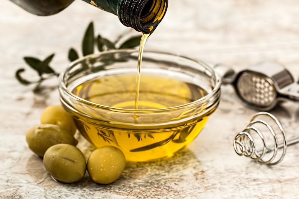 Cold-pressed organic oil (pictured) is one of the best high vibration foods