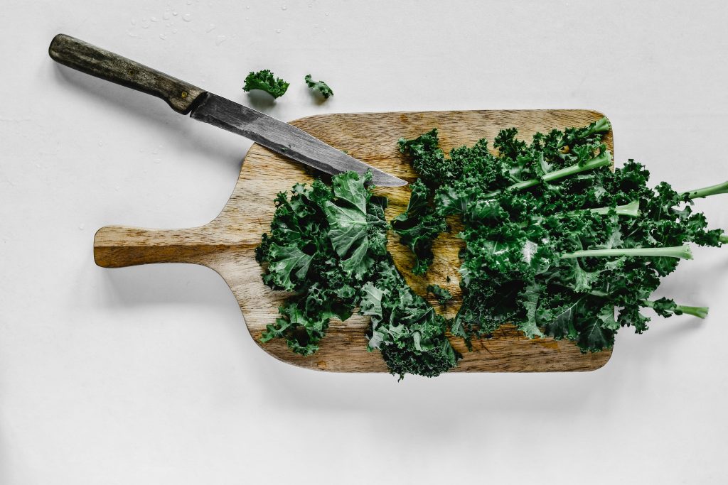 Dark leafy greens (pictured) are one of the best high vibration foods